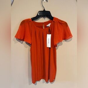 Brand new!! Women’s dress shirt w/ tags